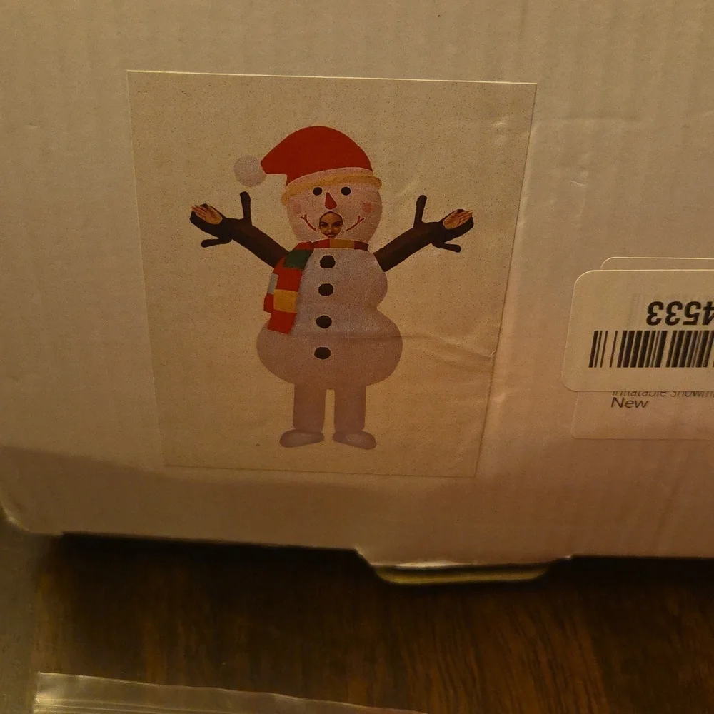 Cheerful Snowman Inflatable with Red Hat and Scarf